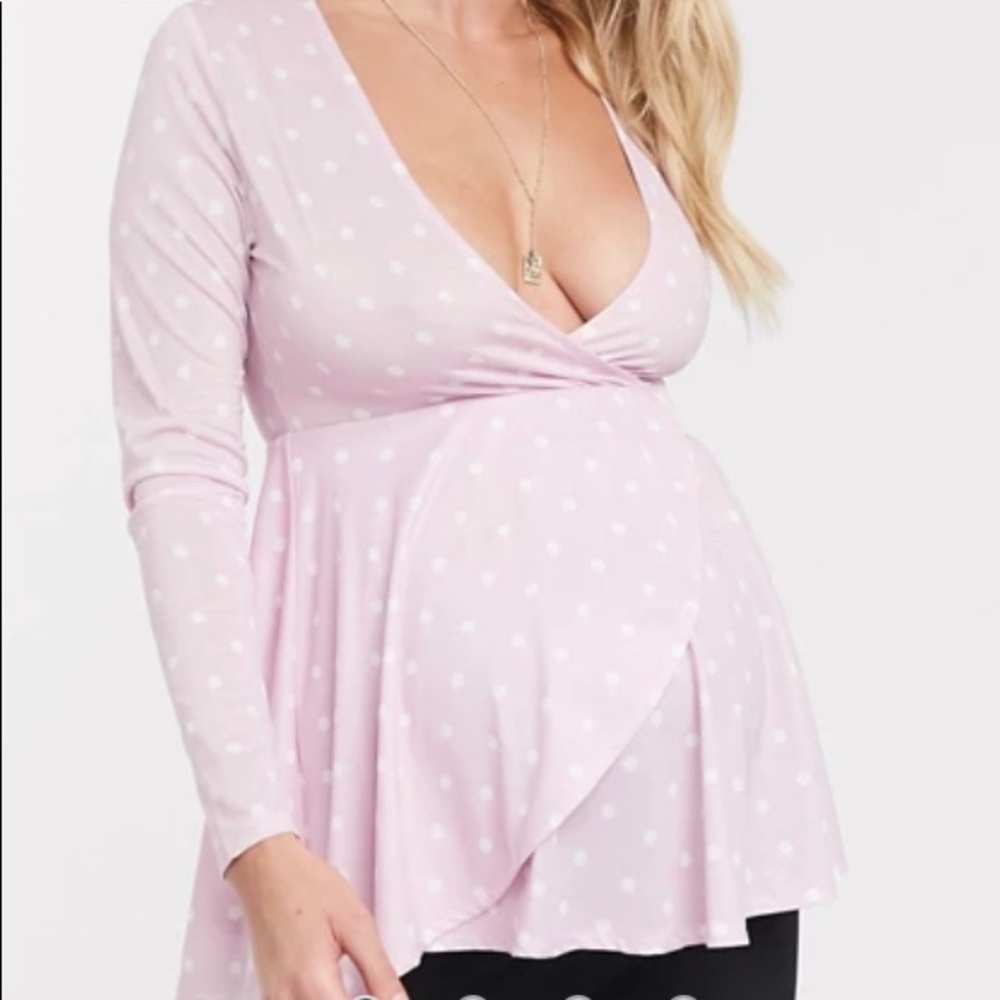 Flattering, never worn maternity top.